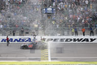Kurt Busch (45) celebrates winning the 2022 AdventHealth 400 at Kansas Speedway. Source: Imagn