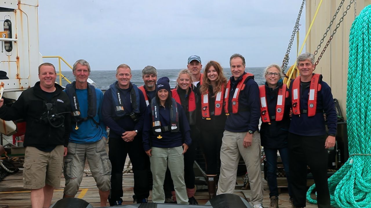 Photo of the group involved in the underwater expedition to explore the Titanic (Image via Netflix Tudum)
