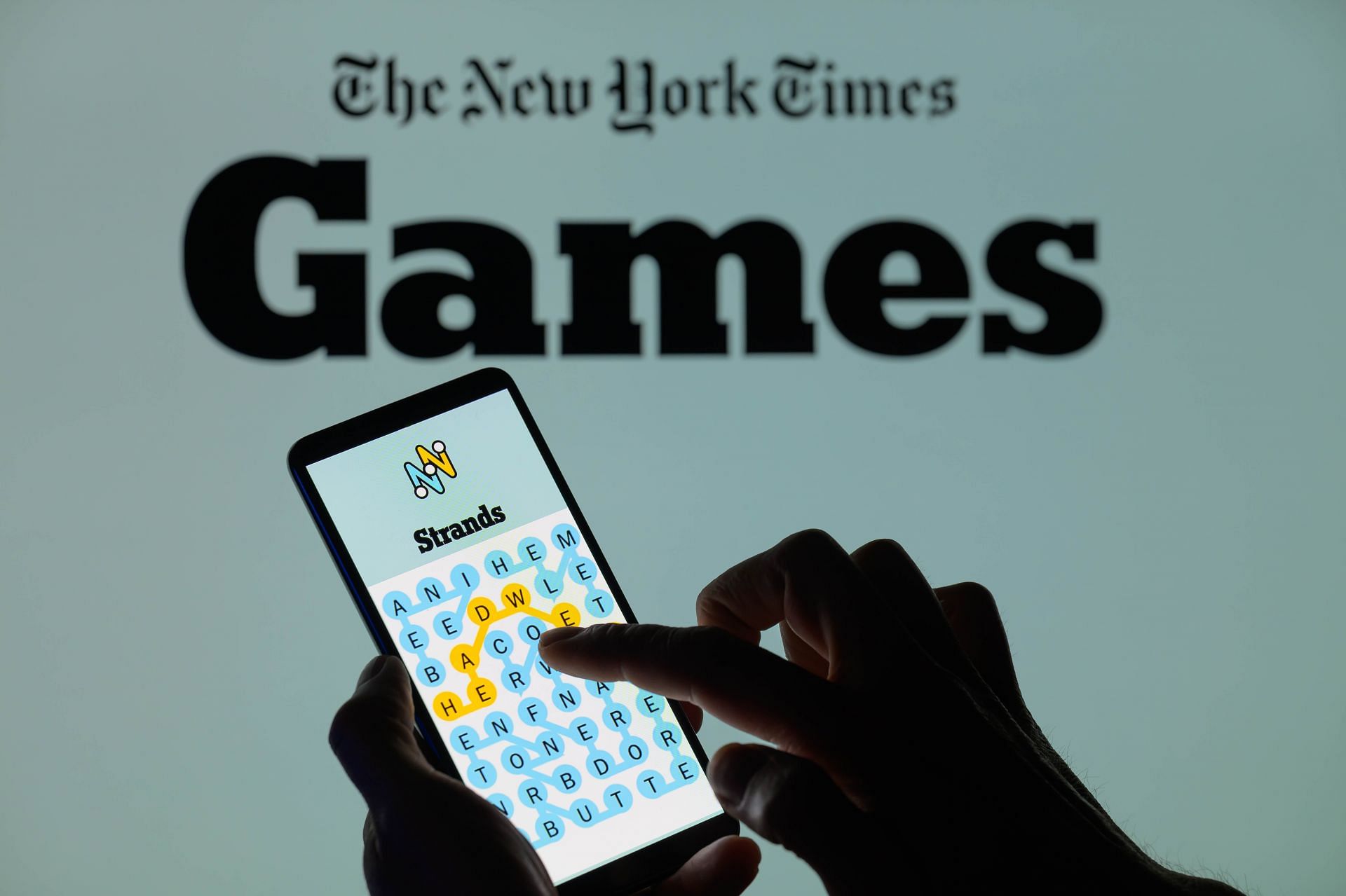 NYT Strands Game - Photo Illustration - Source: Getty