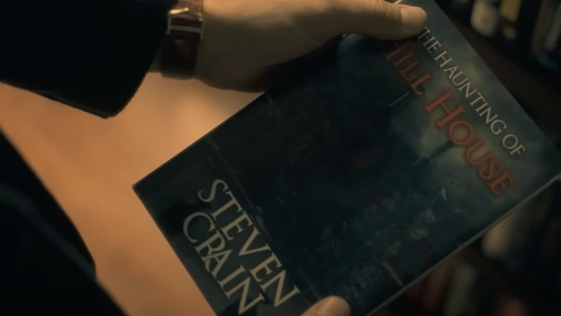 Steven writes a book (Image via YouTube/Still Watching Netflix)