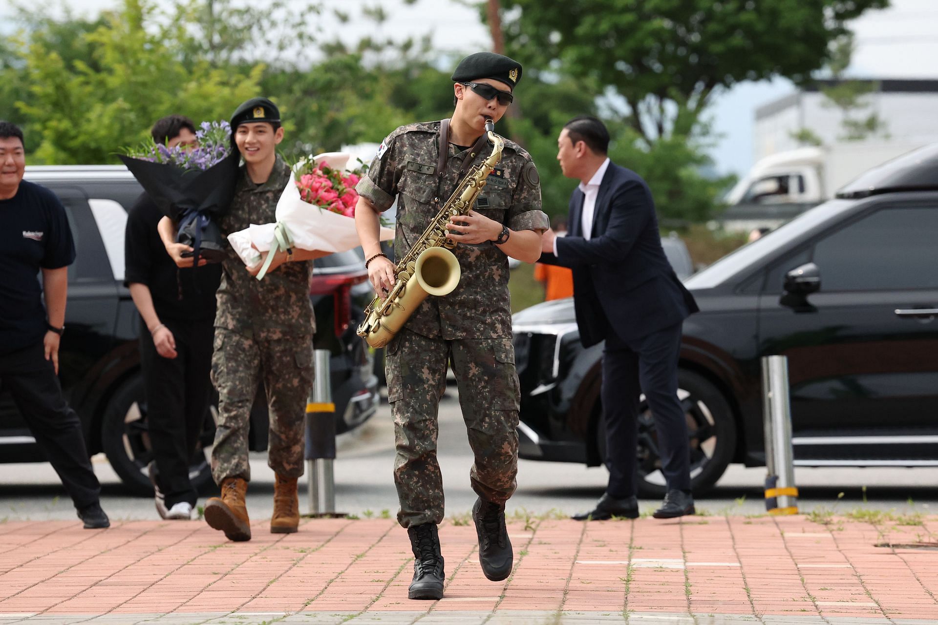            BTS members RM and V completed their mandatory military service on June 10, 2025 in Chuncheon, South Korea. (Image via Getty)