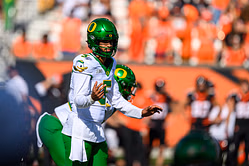 Pics: Oregon QB Dante Moore gives back to the community with a special visit to former school in Detroit