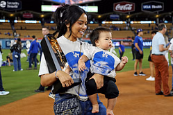 WATCH: Tommy Edman's son Eli throws first pitch with his dad’s glove on bobblehead night in heartwarming moment