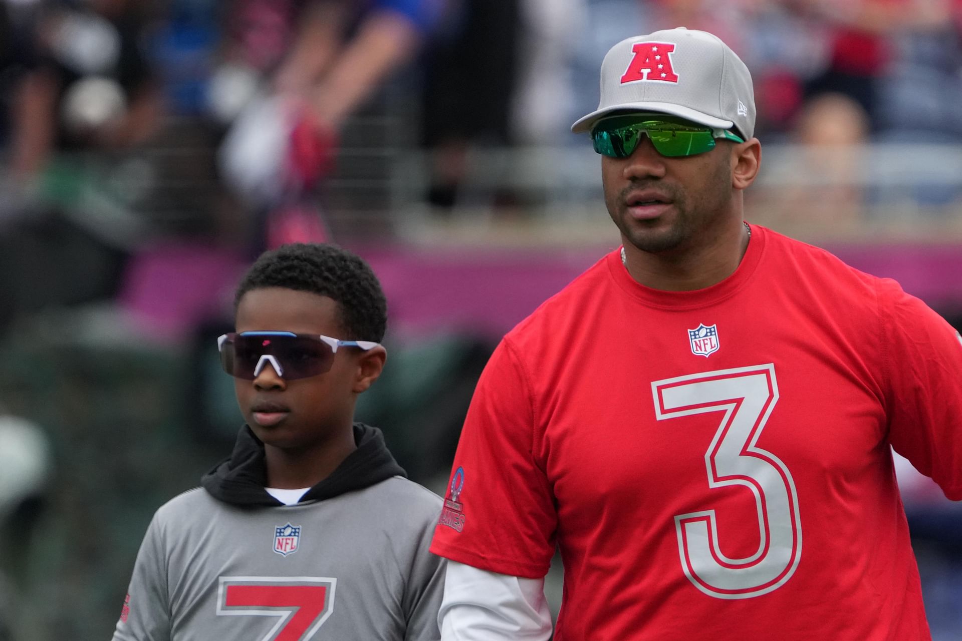 Russell Wilson sends 4-word message as step-son Future models for 3BRAND in Big Apple