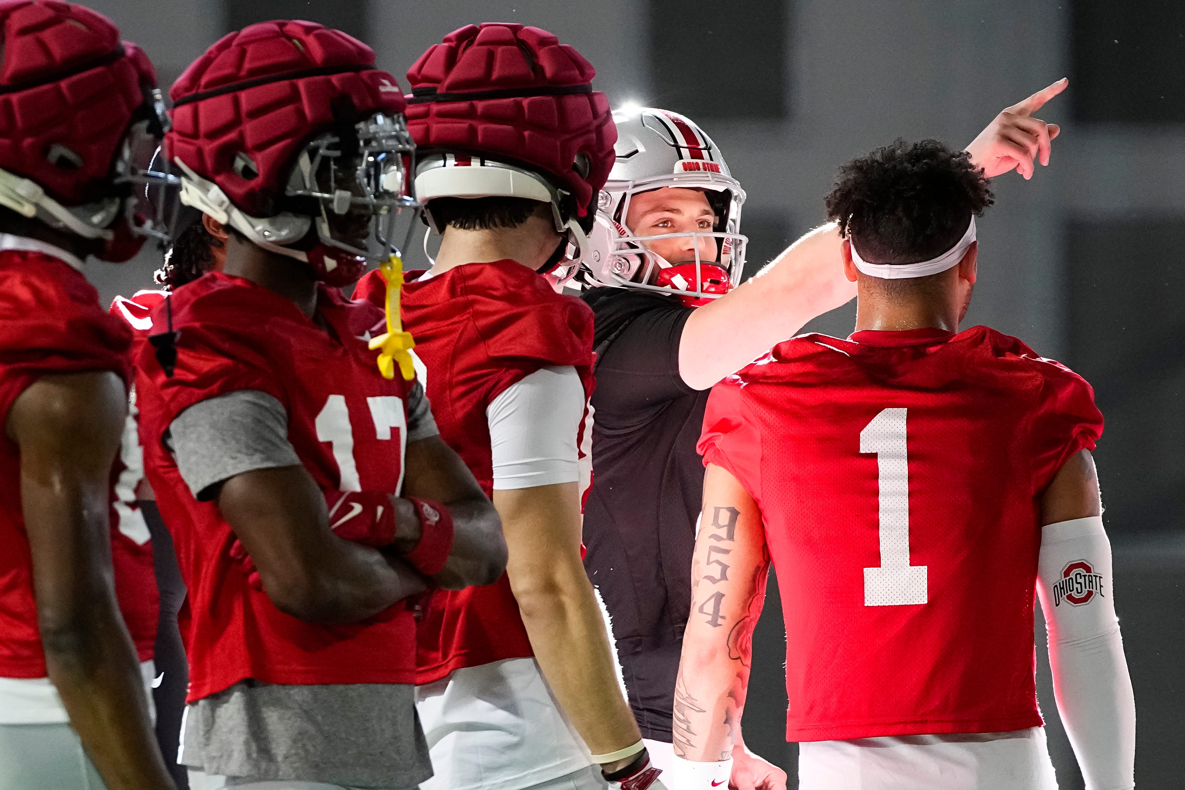 Julian Sayin (10) talks to wide receivers - Source: Imagn