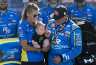 Tony Stewart celebrates with wife Leah Pruett and son Dominic Stewart after winning the NHRA Four Wide Nationals at The Strip at Las Vegas Motor Speedway. Source: Imagn