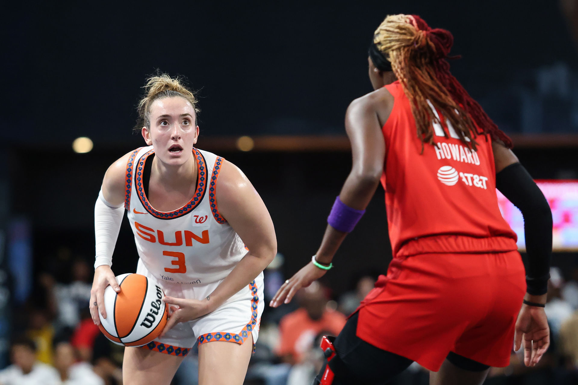 May 25, 2025; College Park, Georgia, USA; Connecticut Sun guard Marina Mabrey (3) looks to the basket for a shot against Atlanta Dream guard Rhyne Howard (10) during the first quarter at Gateway Center Arena at College Park. Mandatory Credit: Jordan Godfree-Imagn Images - Source: Imagn