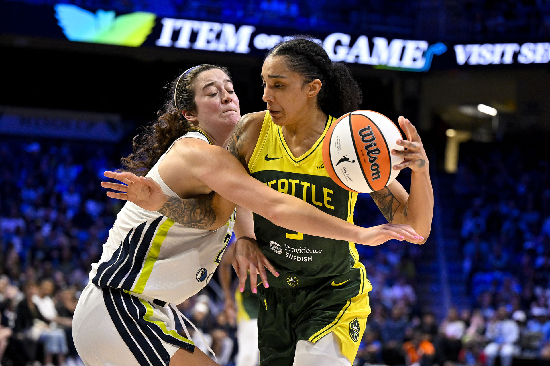 May 19, 2025; Arlington, Texas, USA; Dallas Wings forward Maddy Siegrist (20) and Seattle Storm forward Gabby Williams (5) in action during the game between the Dallas Wings and the Seattle Storm at College Park Center. Mandatory Credit: Jerome Miron-Imagn Images - Source: Imagn