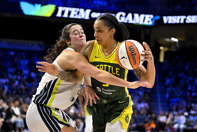 May 19, 2025; Arlington, Texas, USA; Dallas Wings forward Maddy Siegrist (20) and Seattle Storm forward Gabby Williams (5) in action during the game between the Dallas Wings and the Seattle Storm at College Park Center. Mandatory Credit: Jerome Miron-Imagn Images - Source: Imagn