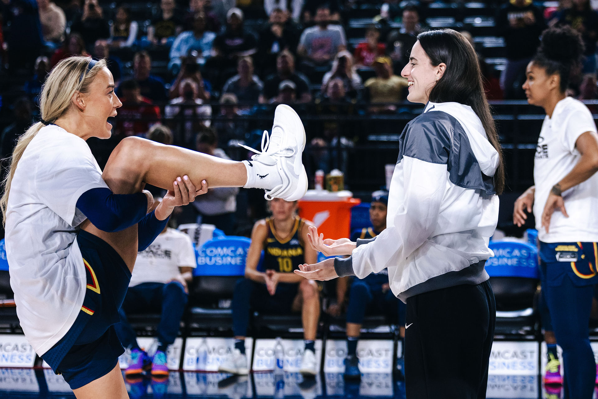 May 28, 2025; Washington, District of Columbia, USA; Indiana Fever guard Sophie Cunningham (left) talks with Indiana Fever guard Caitlin Clark (right) before the game against the Washington Mystics at Entertainment &amp; Sports Arena. Mandatory Credit: Emily Faith Morgan-Imagn Images - Source: Imagn