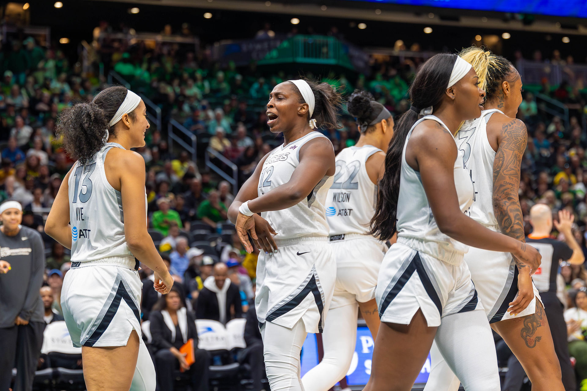 Jun 1, 2025; Seattle, Washington, USA; Los Vegas Aces guard Chelsea Gray (12) cheers to player Las Vegas Aces guard Aaliyah Nye (13) for a call made by referee in their favor in the fourth period at Climate Pledge Arena. Mandatory Credit: Melissa Levin-Imagn Images - Source: Imagn