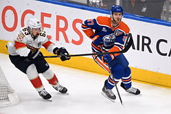 Watch: Brad Marchand and Darnell Nurse trade several body shots behind the net
