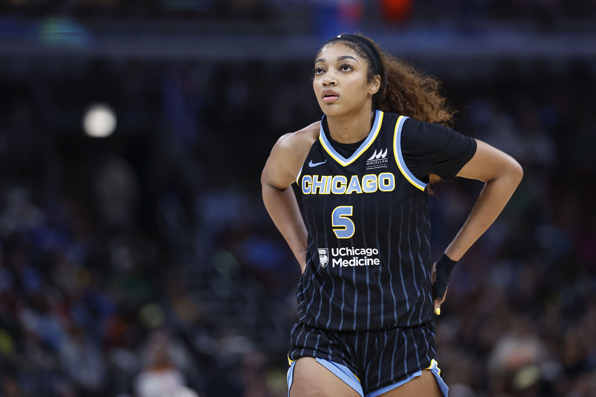 Jun 7, 2025; Chicago, Illinois, USA; Chicago Sky forward Angel Reese (5) walks on the court during the second half of a WNBA game against the Indiana Fever at United Center. Mandatory Credit: Kamil Krzaczynski-Imagn Images - Source: Imagn