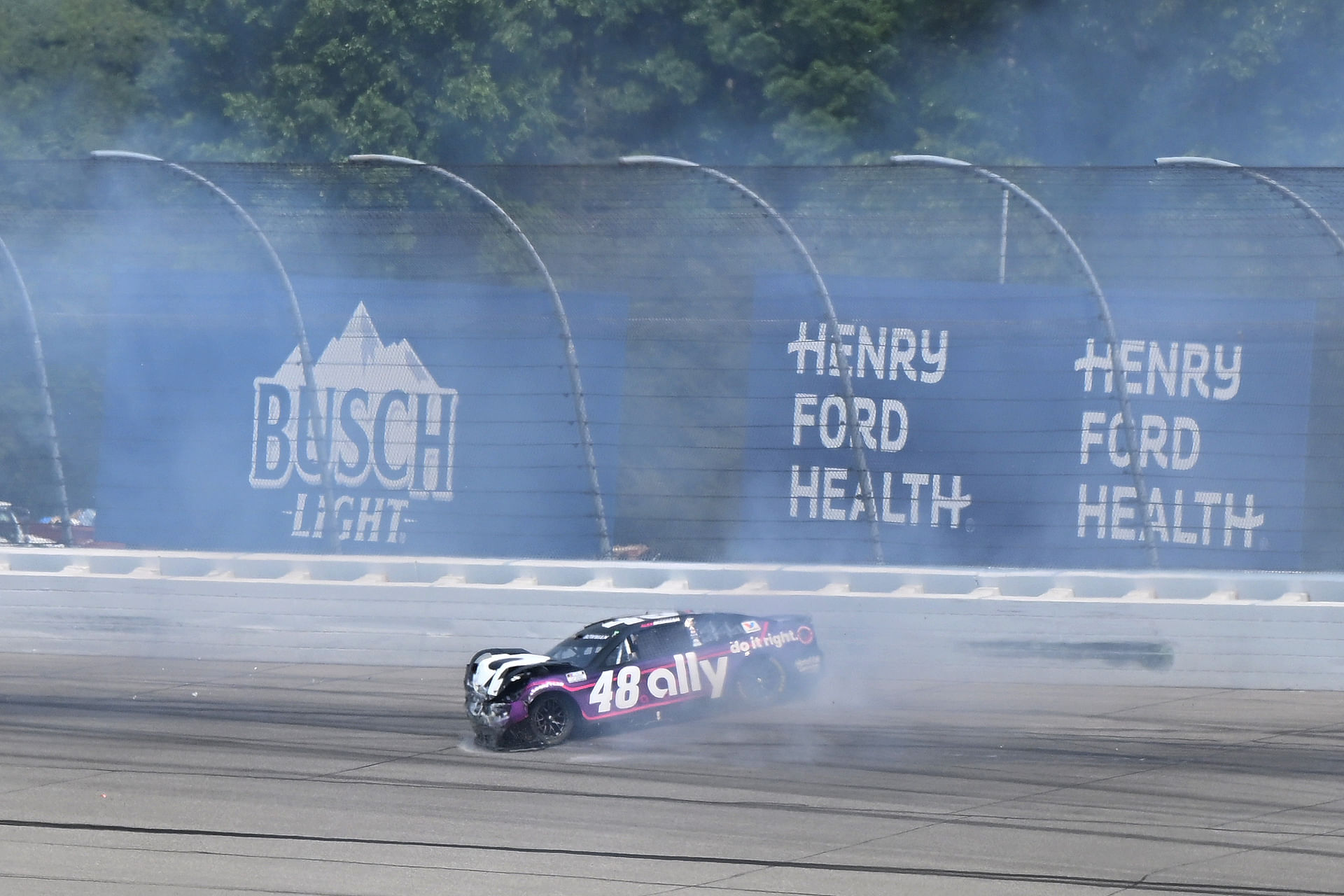 Alex Bowman (48) spins down the track after hitting the wall in turn two just after a restart in stage two of the FireKeepers Casino 400 at Michigan International Speedway - Source: Imagn