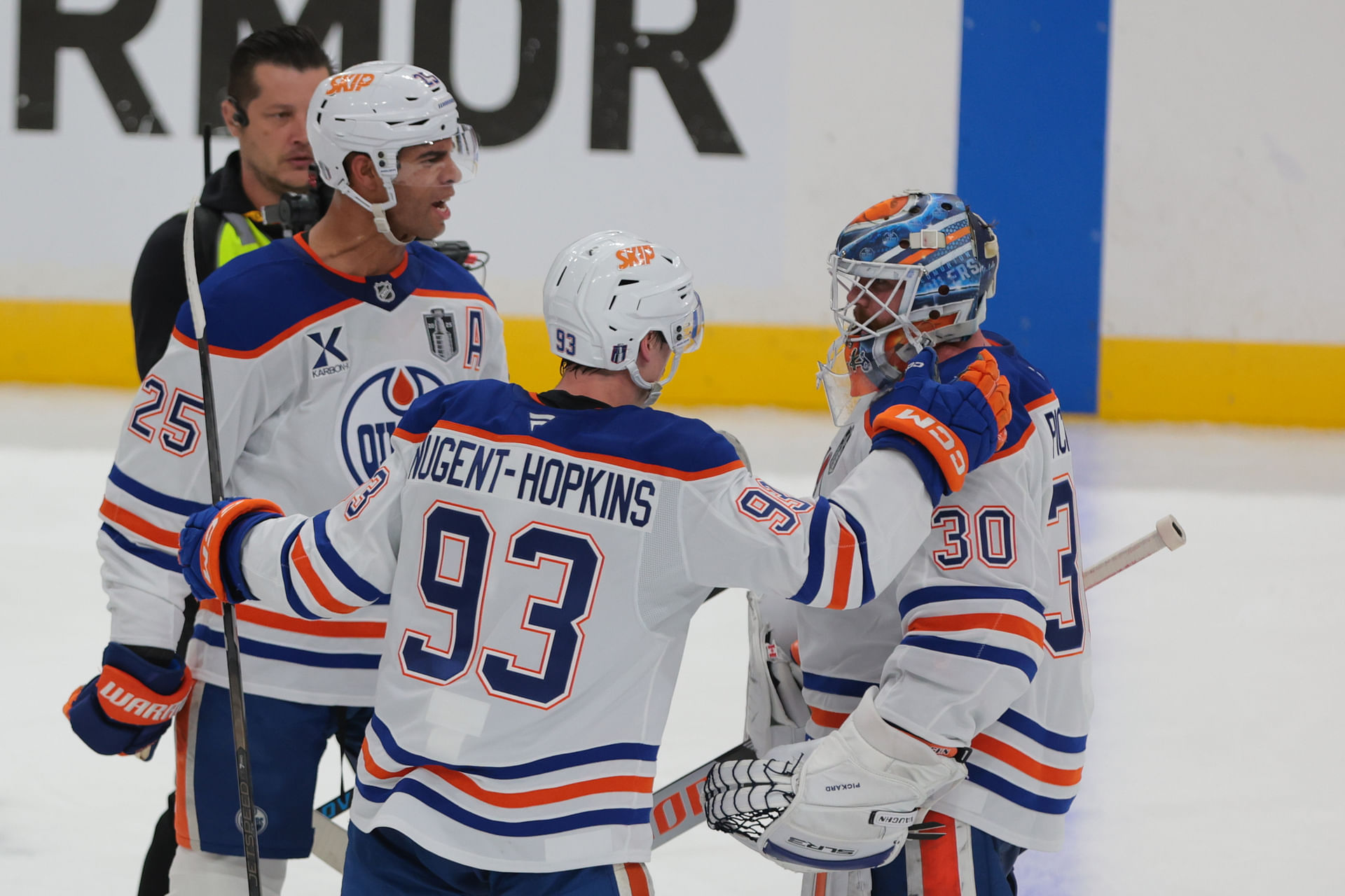 Jun 12, 2025; Sunrise, Florida, USA; Edmonton Oilers center Ryan Nugent-Hopkins (93) and defenseman Darnell Nurse (25) celebrate with goaltender Calvin Pickard (30) after the win in overtime against the Florida Panthers in game four of the 2025 Stanley Cup Final at Amerant Bank Arena. Mandatory Credit: Sam Navarro-Imagn Images - Source: Imagn