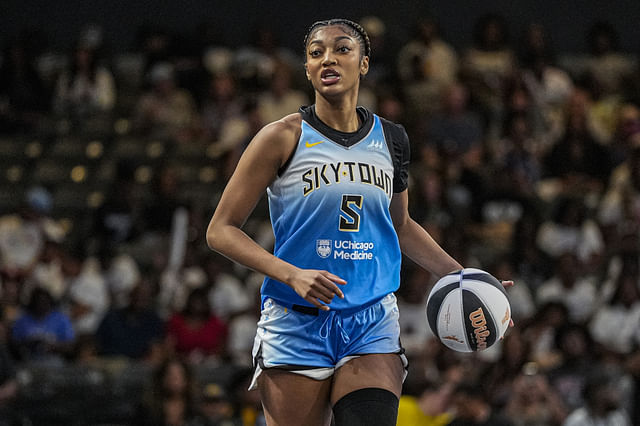 Jun 13, 2025; College Park, Georgia, USA; Chicago Sky forward Angel Reese (5) controls the ball against the Atlanta Dream during the first half at Gateway Center Arena at College Park. Mandatory Credit: Dale Zanine-Imagn Images - Source: Imagn