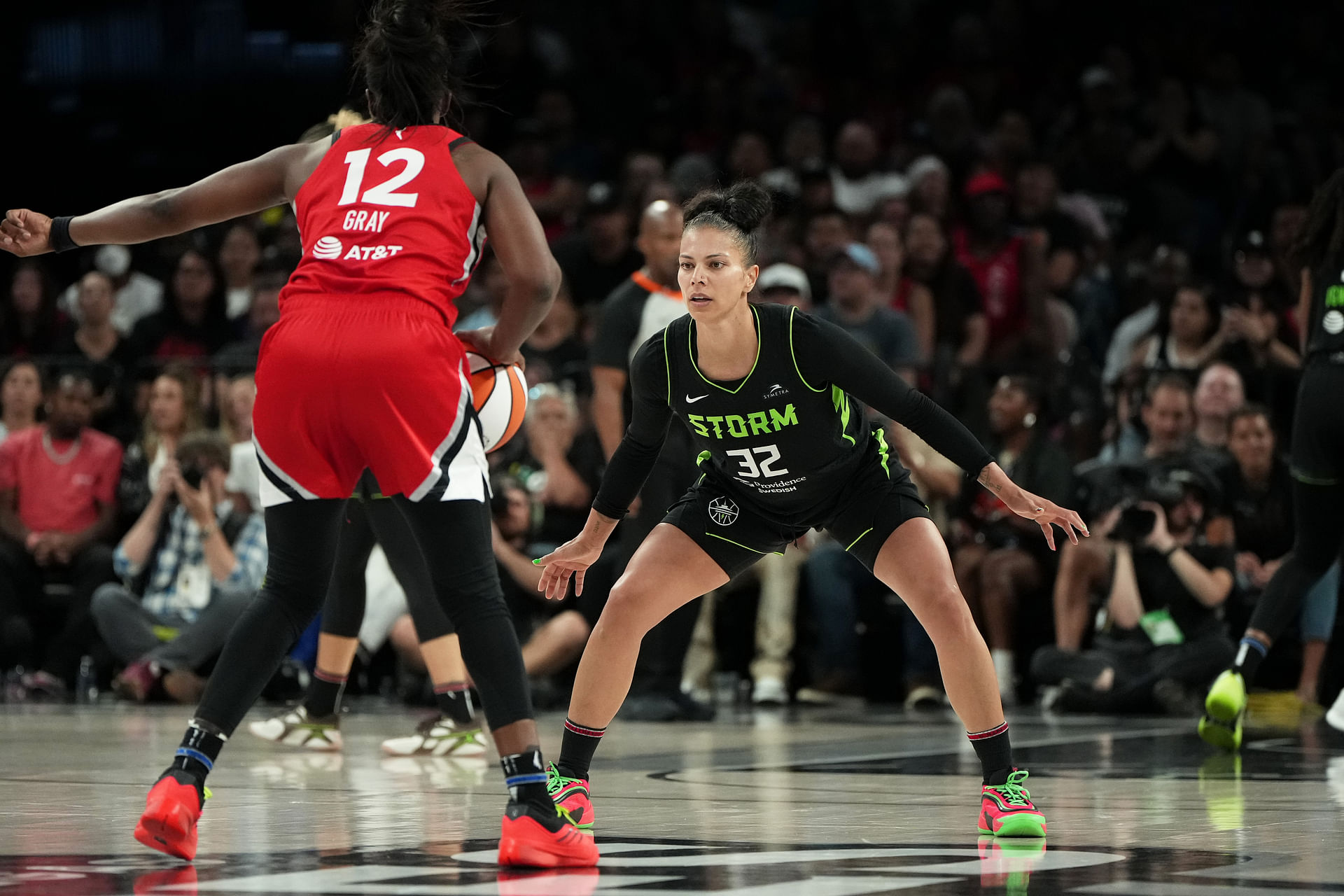Jun 20, 2025; Las Vegas, Nevada, USA; Seattle Storm forward Alysha Clark (32) guards against Las Vegas Aces guard Chelsea Gray (12) during the second half of a WNBA basketball game at Michelob Ultra Arena. Mandatory Credit: Lucas Peltier-Imagn Images - Source: Imagn