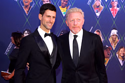 Novak Djokovic's ex-coach Boris Becker reacts as Serb arrives at Wimbledon to redeem French Open loss