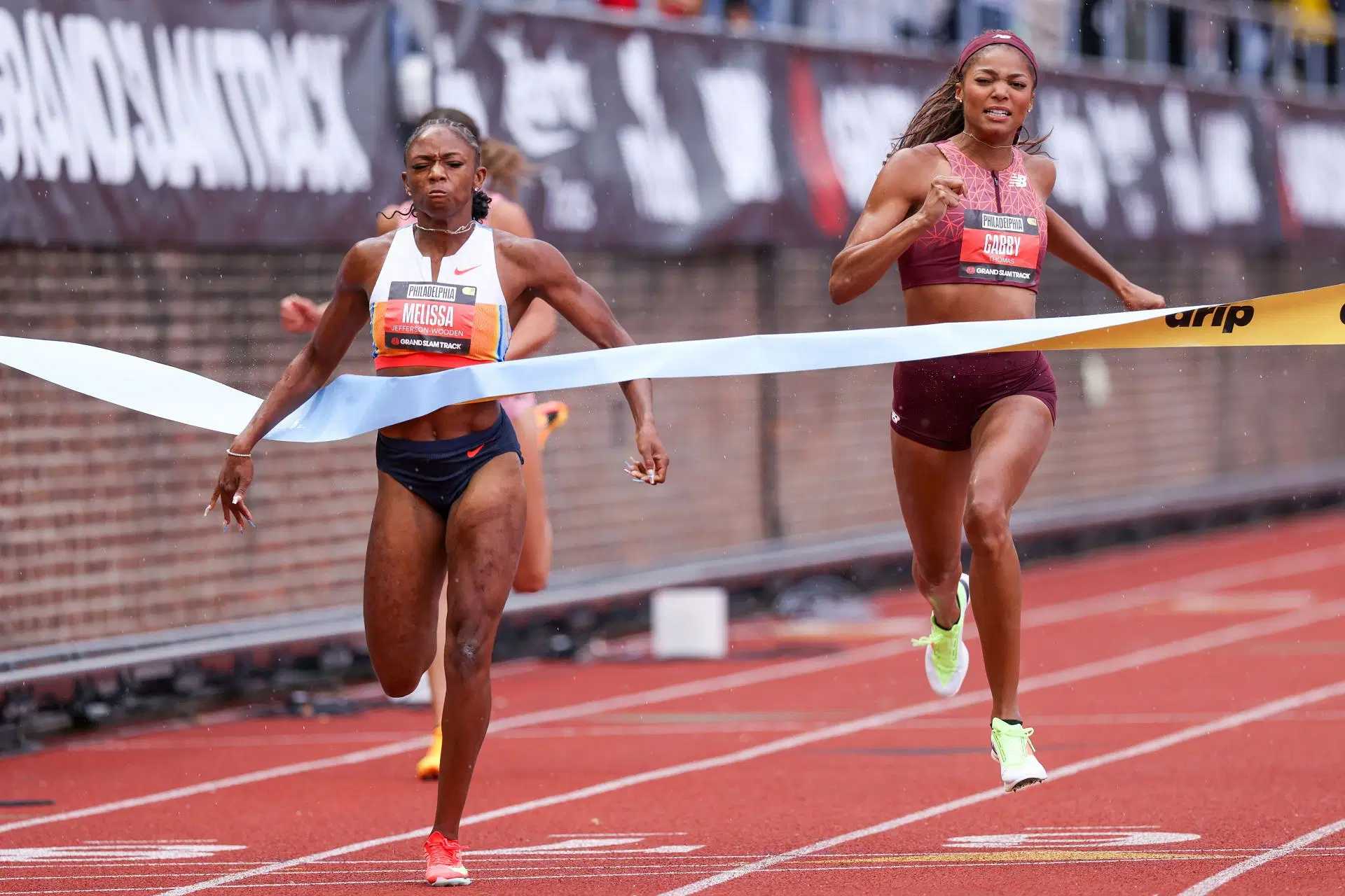 Melissa Jefferson [Left] in action at the Grand Slam Track League in Philadelphia [Image Source: Getty]