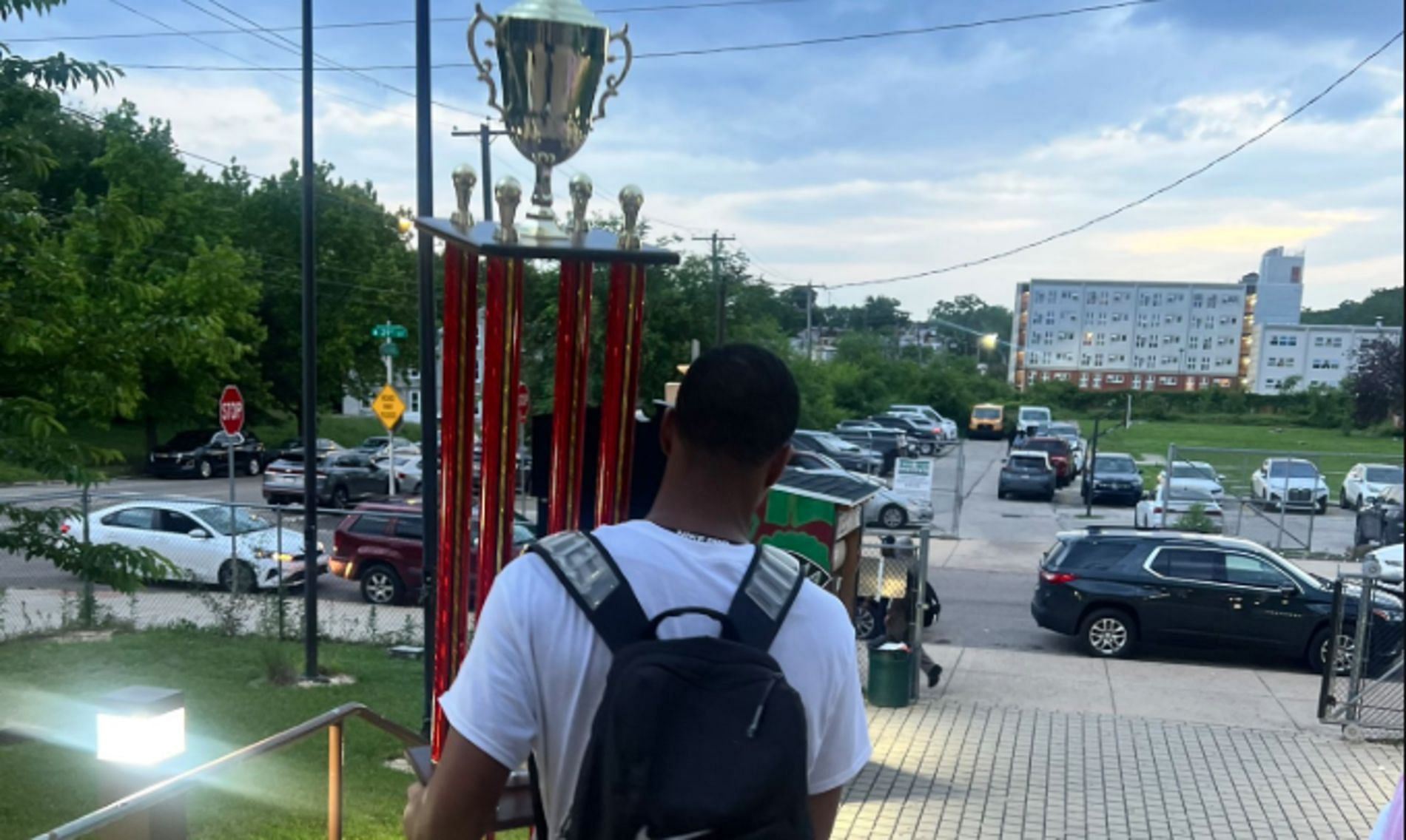 Korey Francis with his MVP trophy (source: X/ @bpfriarshoops)