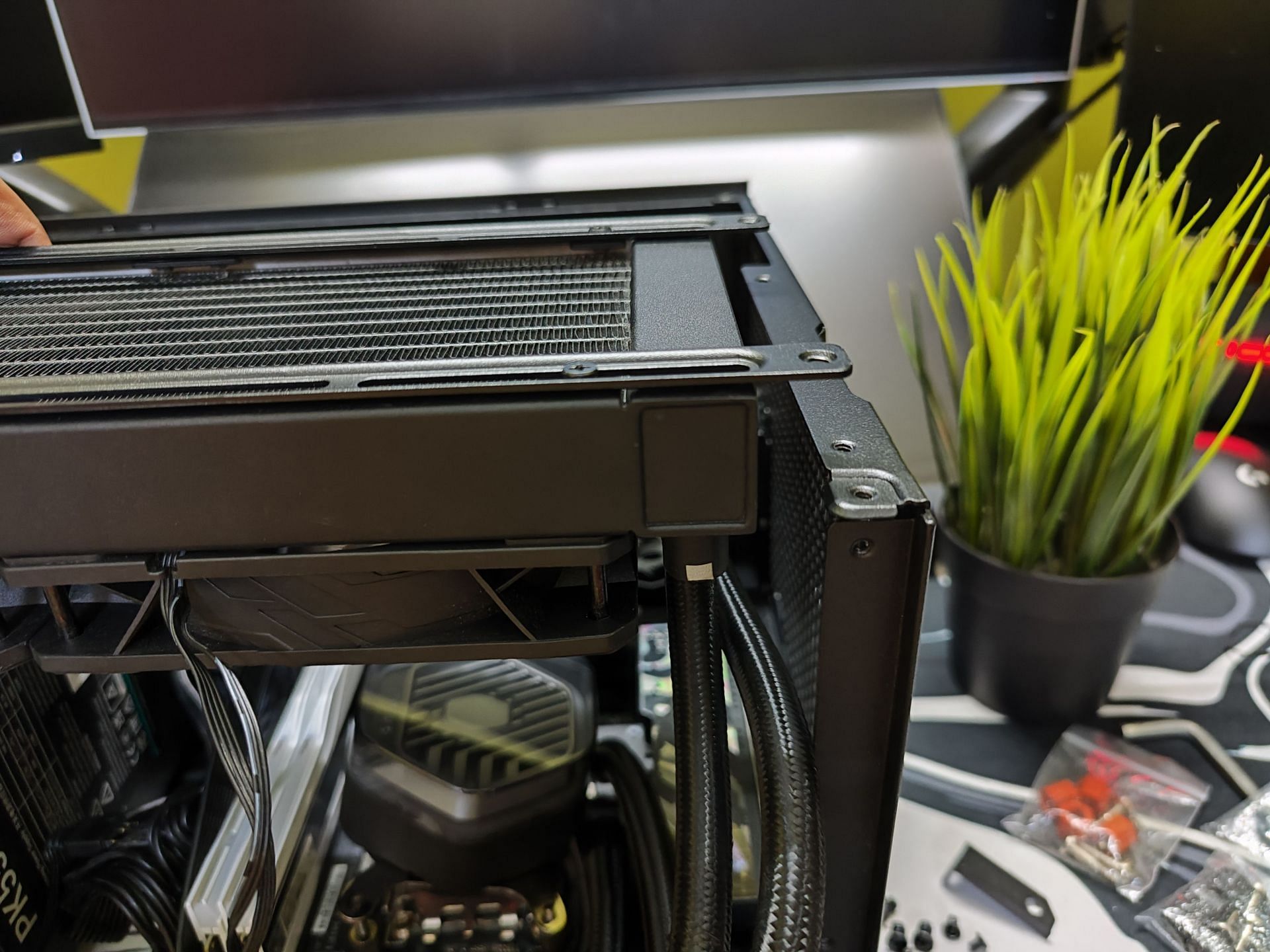 A water cooler will only fit if you have an SFF PSU (Image via Sportskeeda)