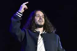 What does Russ think about Timbaland launching an AI label and signing virtual artists?