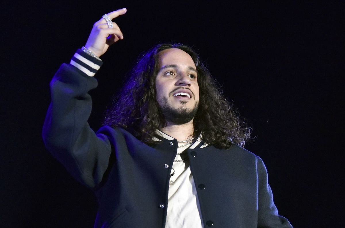 What does Russ think about Timbaland launching an AI label and signing virtual artists?