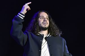What does Russ think about Timbaland launching an AI label and signing virtual artists?