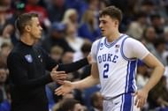 Cooper Flagg (#2) checks out as head coach Jon Scheyer of the Duke Blue Devils looks on during the first half against the Arizona Wildcats in the 2025 NCAA Tournament. Photo: Getty