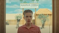 Johansson plays Korda's "love interest" (Image via YouTube/Focus Features)
