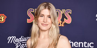 Eugenie Bouchard all smiles as she celebrates Red Sox's win over Yankees from the stands in Boston