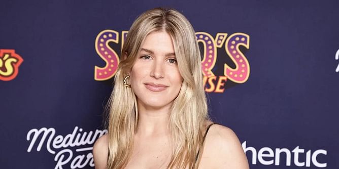 Eugenie Bouchard all smiles as she celebrates Red Sox's win over Yankees from the stands in Boston