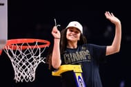 Haley Jones (#30) of the Stanford Cardinal cuts the net after they defeated the Arizona Wildcats in the championship game of the 2021 NCAA Womens Basketball Tournament at Alamodome. Photo: Getty