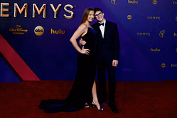 Stephen Nedoroscik rocks grey blazer while girlfriend Tess McCracken sports blue floral dress at Brody Malone's wedding