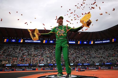 Daniel Suarez, driver of the #9 Quaker State Chevrolet, celebrates with a pinata after winning the NASCAR Xfinity Series The Chilango 150 at Autodromo Hermanos Rodriguez - Source: Getty