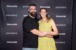 Jason Kelce's wife Kylie reacts as Eagles vet contributes to raise over $1,000,000 at charity event while stripping down to his underwear