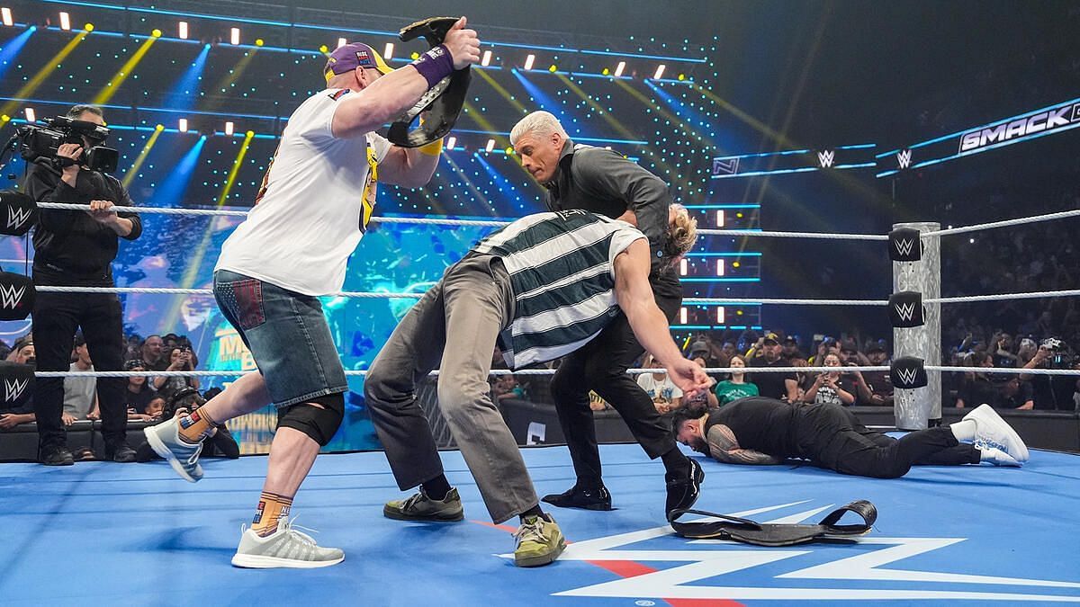 John Cena hits The American Nightmare with the Undisputed WWE Championship. (Photo: WWE.com)