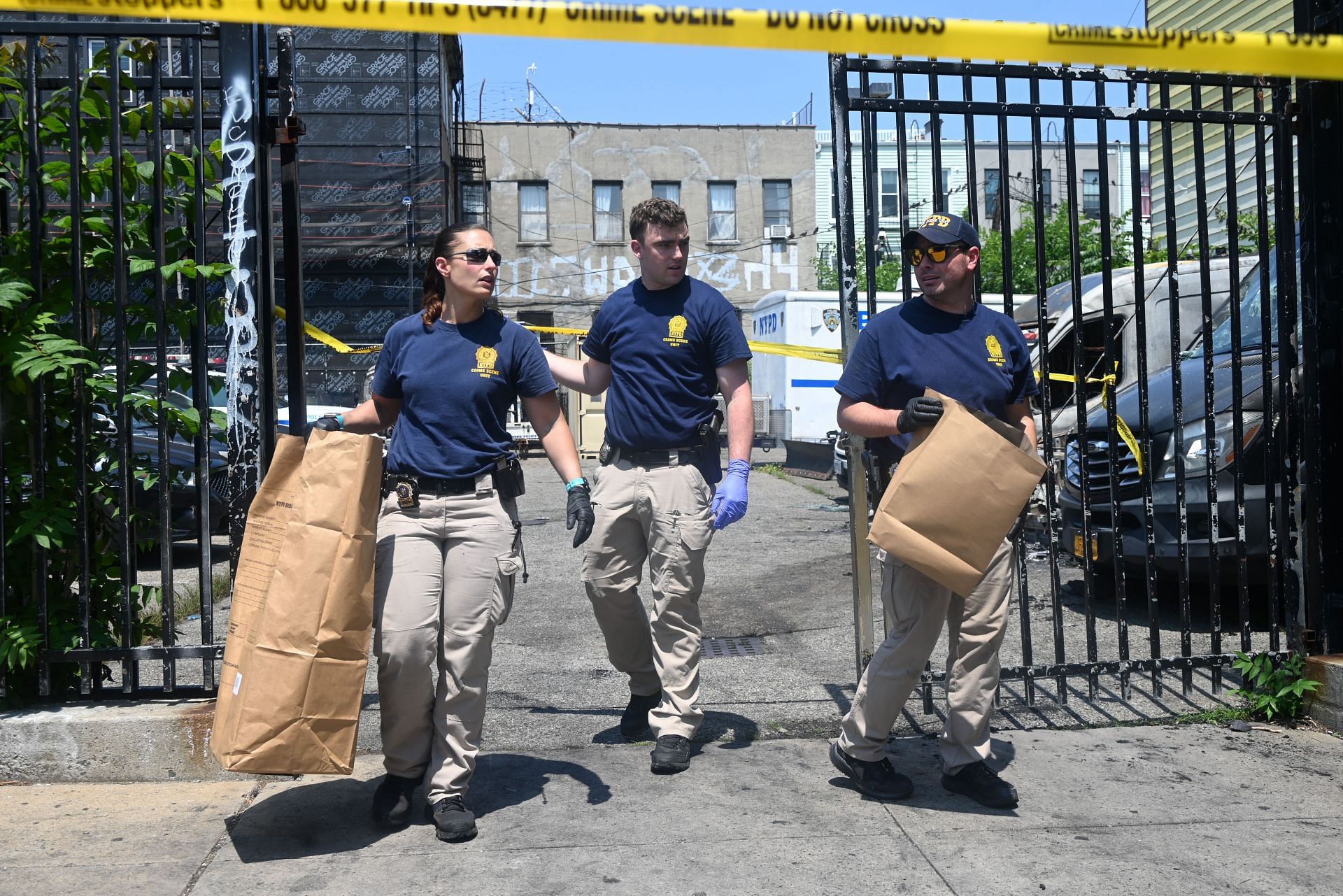 NYPD vehicles set on fire in Brooklyn parking lot - Source: Getty