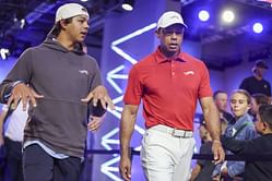Tiger Woods and Charlie Woods flaunt Sun Day Red apparel as the father son duo is spotted at the Tequesta Country Club