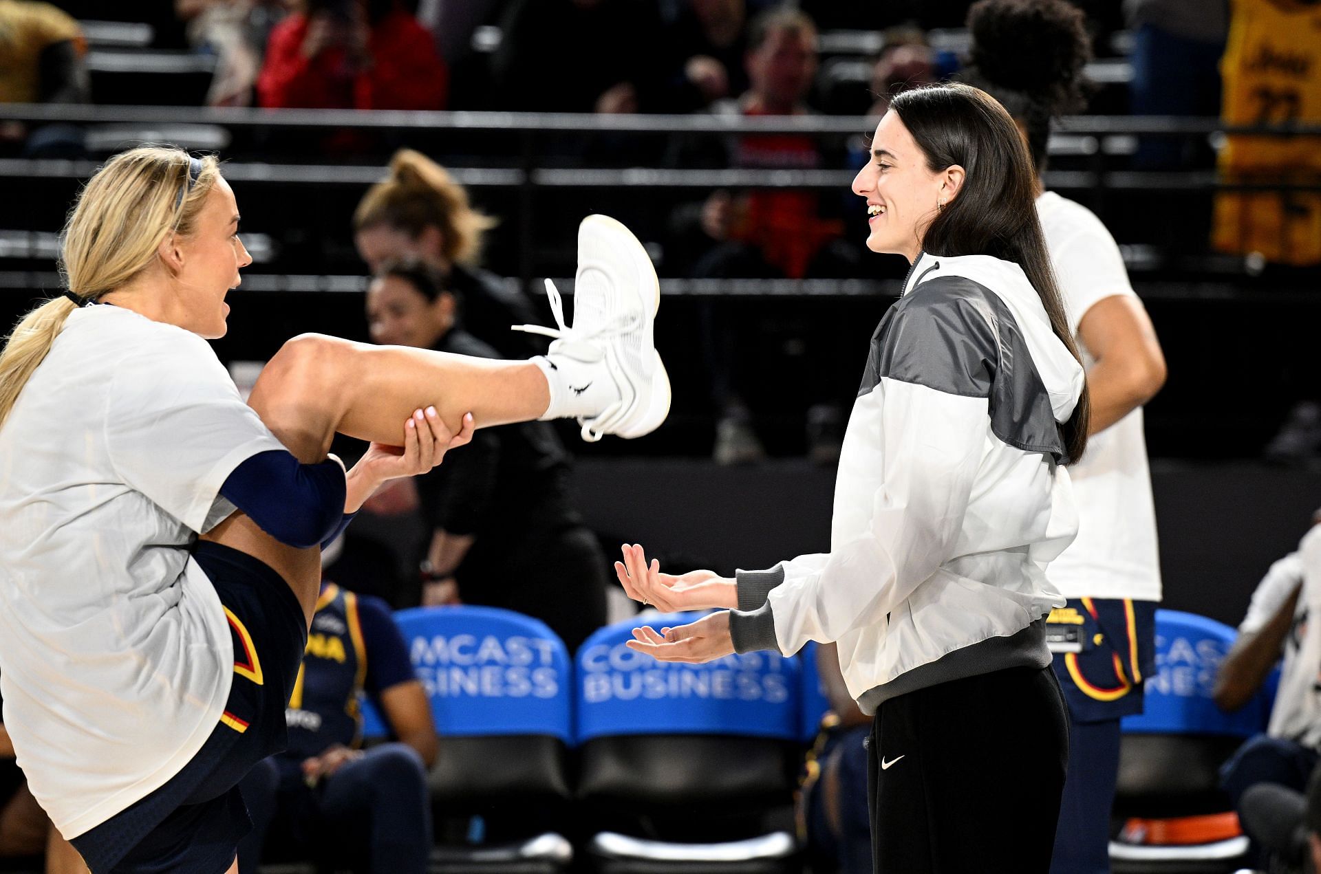 Cunningham sharing a candid moment with Clark [Credit: Getty]