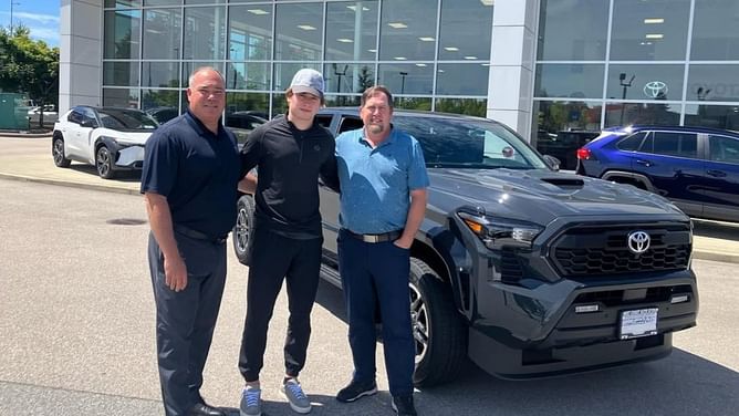 Macklin Celebrini takes delivery of a brand-new 2025 Toyota Tacoma from BC dealership