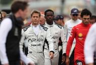 F1 co-stars Brad Pitt and Damson Idris with Carlos Sainz before the F1 Grand Prix of Great Britain. Source: Getty
