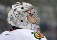 Chicago Blackhawks goalie Corey Crawford paid tribute to Plante featuring Plante on his mask - Source: Imagn