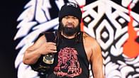 Top female WWE champion shares photo with Jacob Fatu; both seen holding their respective titles