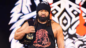 Top female WWE champion shares photo with Jacob Fatu; both seen holding their respective titles