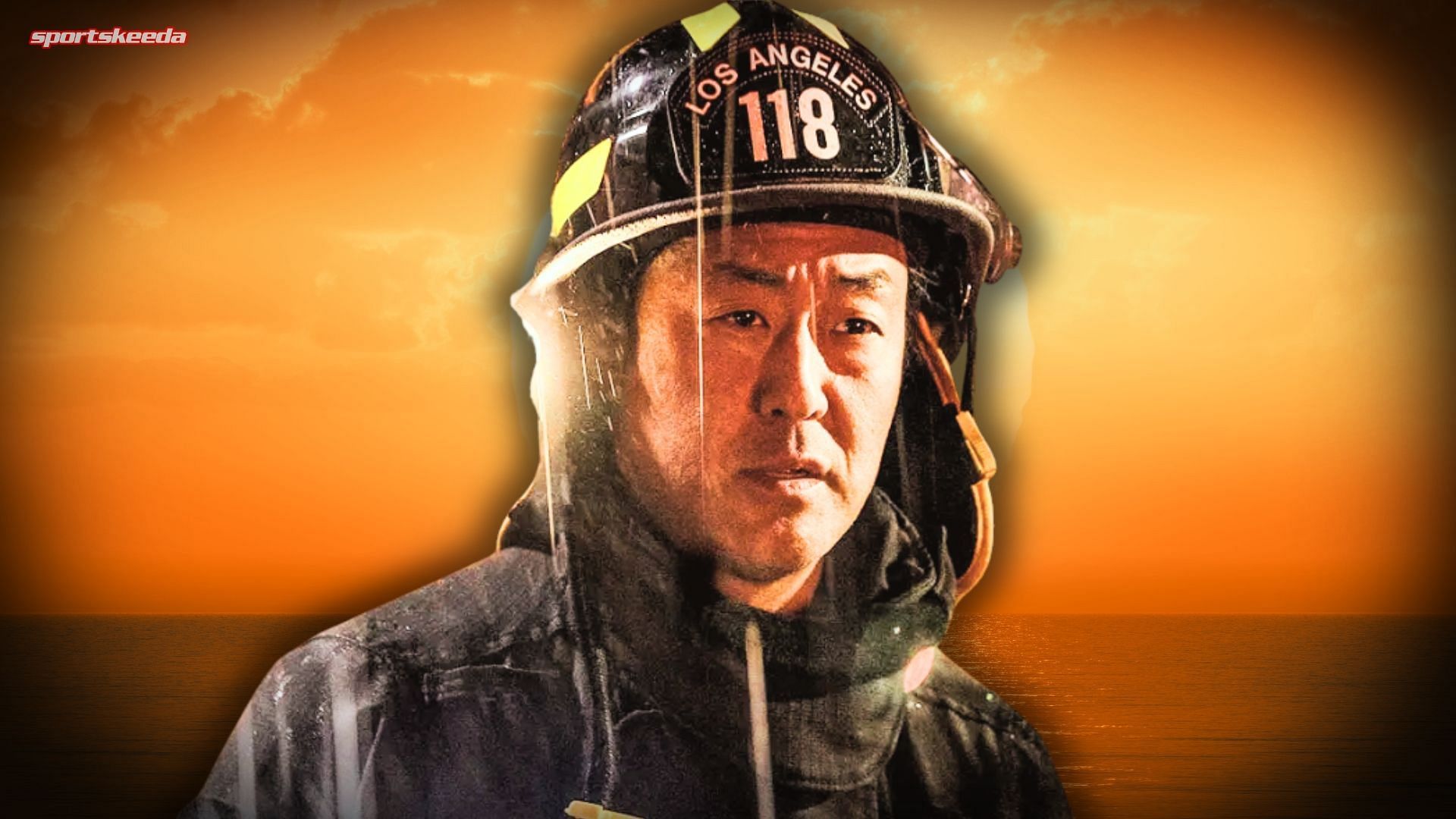 Chimney wearing a helmet marked &ldquo;Los Angeles 118&rdquo; with a sunset background in 9-1-1.