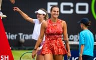 Aryna Sabalenka (in red) retires during her quarterfinal match at the 2024 Berlin Ladies Open (Source: Getty)