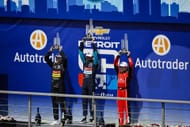 Colton Herta, Kyle Kirkwood, and Santino Ferrucci on the Chevrolet Detroit Grand Prix podium - Source: Getty