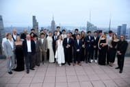 Carlos Sainz with fellow drivers, team principals, and their partners in the Rockefeller Center, New York. Source: Getty
