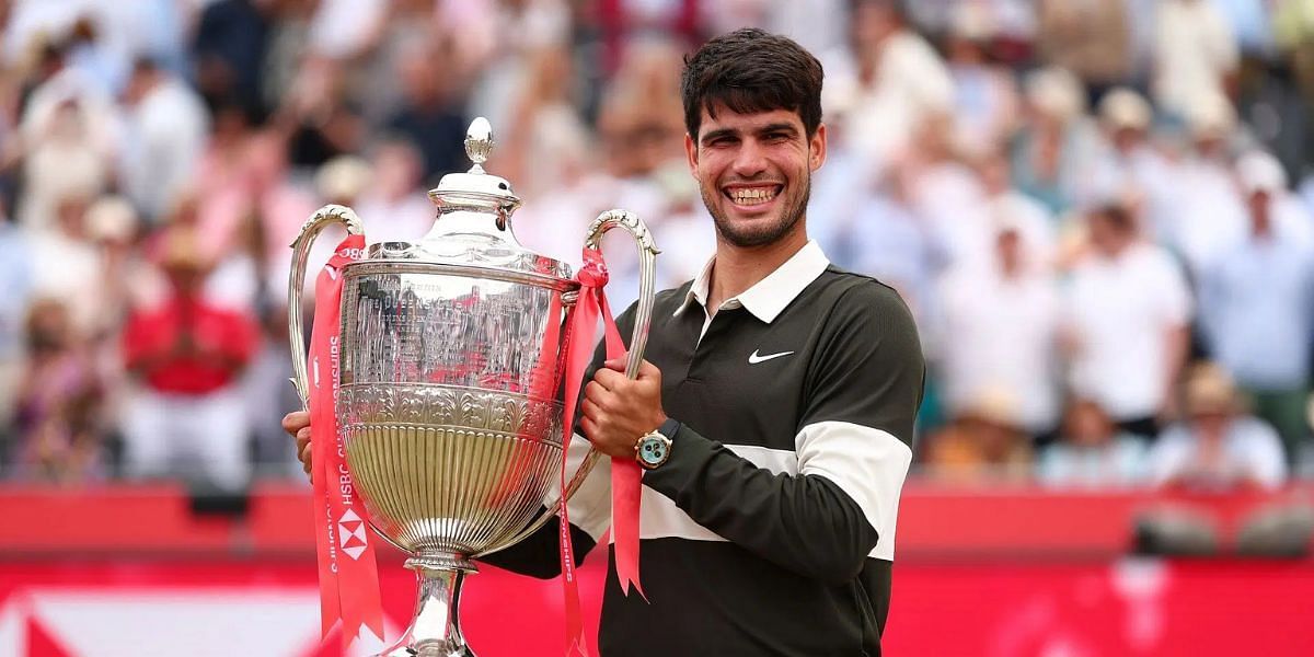 Carlos Alcaraz strikes an all-smiles pose with the 2025 HSBC Championships men